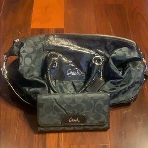 Black Signature Coach purse and wallet.